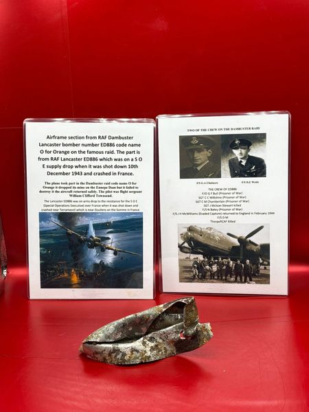 Aluminium airframe section with green paintwork remains and red painted marking from RAF Dambuster Lancaster bomber code name O for Orange on the raid, number ED886 shot down 10th December 1943 on arms drop to the resistance for the S O E over France