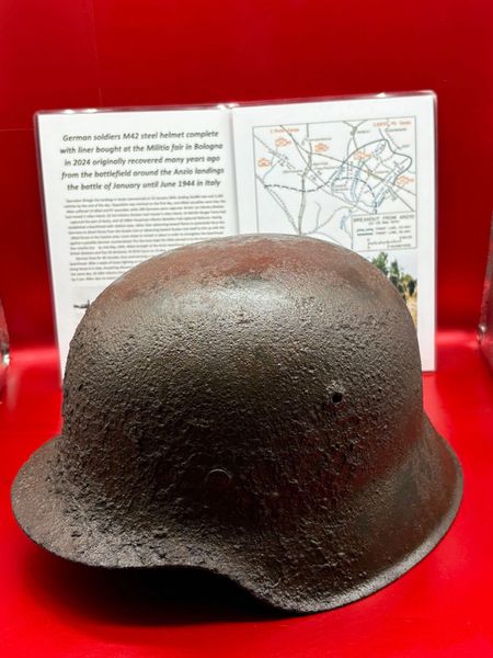 Lovely condition relic complete German Army M42 steel helmet with near complete liner and some paintwork remains bought at the Militia fair in Bologna in 2024 originally recovered many years ago from the Anzio landings the battle of 1944 in Italy