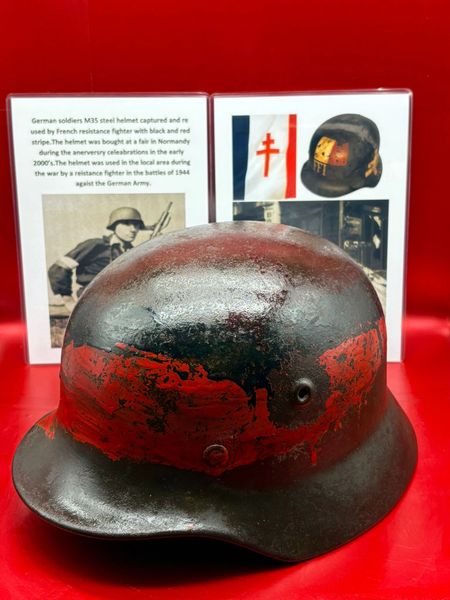 Fantastic condition,complete and totally rare German soldiers M35 steel helmet captured and re used by French resistance fighter with black and red stripe it was bought at a fair in Normandy during the anerversry celeabrations in the early 2000’s,