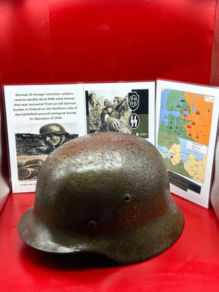 Totally rare fantastic complete German SS foreign volunteer soldiers reverse double decal M40 steel helmet that was recovered from an old German bunker in Finland on the Northern side of the battlefield around Leningrad during its liberation of 1944.