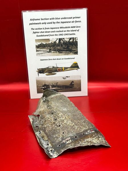 Aluminium airframe panel with lots of its blue undercoat primer paint only used by Japanese air force from Mitsubishi A6M Zero fighter shot down/crashed in the air war over the Island of Guadlcanal from 1942-1943 battlefield