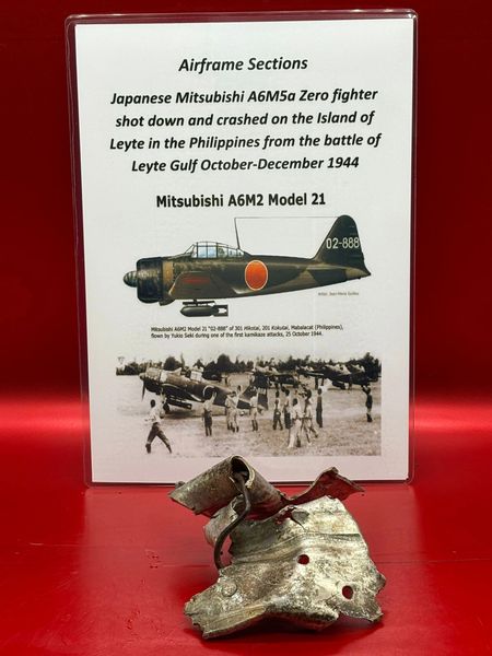 Very rare clean aluminium airframe section with some 2 tone green camouflage paintwork remains from Japanese Mitsubishi A6M5a Zero fighter shot down and crashed on the Island of Leyte in the Philippines,battle of Leyte Gulf October-December 1944