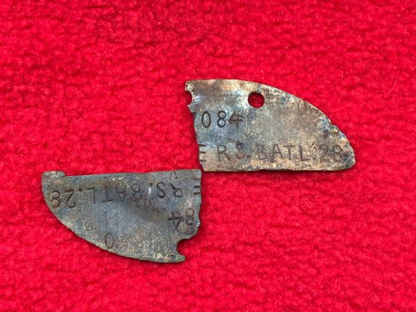 German soldiers half dog tag with some markings, 2nd company Motorised infantry replacement battalion 28 part of 8th infantry division recovered in Bohemia and Moravia 1945 battlefield