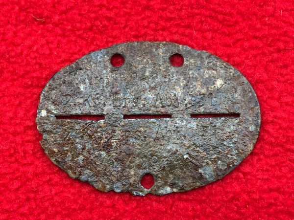 German soldiers complete dog tag rare late war zinc made for the 2nd company motorised Infantry replacement battalion 31 part of 24th infantry Division recovered in the Kurland Pocket 1944-1945 battle in Latvia