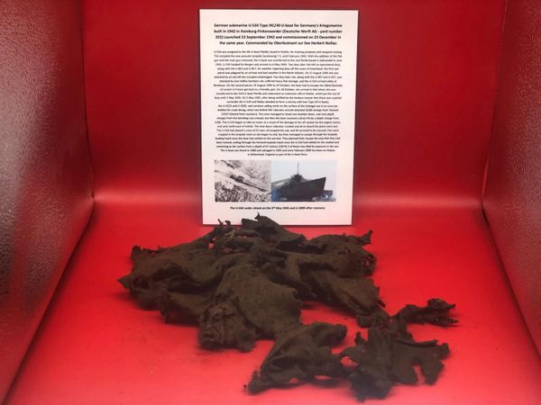 Very rare German crewman's uniform jacket remains one large section and a small section recovered from U-Boat U534 which was sunk on the 5th May 1945