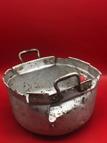 French made cooking pot re used by the German Army with battle damage used by German soldier of 212 Volksgrenadier-Division recovered near town of osweiler, Luxemburg from the battle of the Bulge 1944-1945