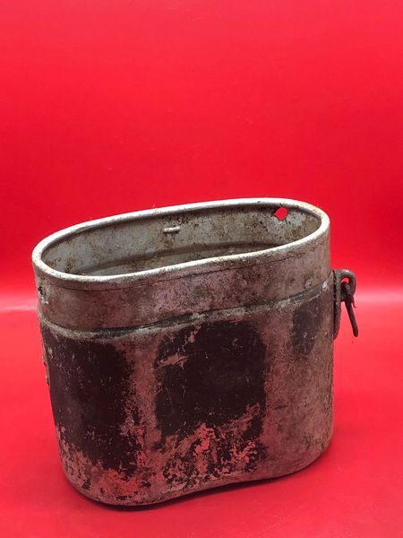 German soldiers aluminium mess tin, maker marked dated 1935 with some original black paintwork and impact holes in the top recovered from around the village of Plota near Prokhorovka on the battlefield at Kursk 1943 in Russia