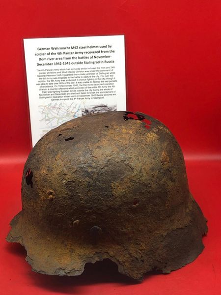 German Army M42 steel helmet with green paintwork remains used by soldier of the 4th Panzer Army recovered on the Dom river area from the battles of November- December 1942 outside Stalingrad