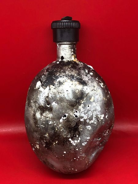 German army issue aluminium water bottle which has faint maker marked dated 1940, solid relic recovered near town of osweiler, Luxemburg from the battle of the Bulge 1944-1945