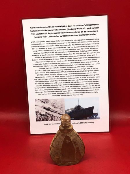 German perfume glass bottle complete unbroken very dirty from the sea bed recovered from inside U-Boat U534 which was sunk on the 5th May 1945 by RAF bombers