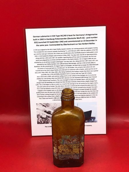 German glass bottle with remains of paper label complete unbroken very rare to find recovered from inside U-Boat U534 which was sunk on the 5th May 1945 by RAF bombers