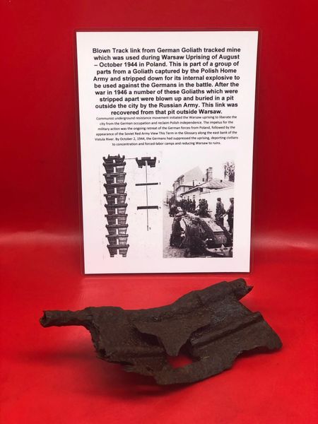 Blown track link section nice solid relic from German Goliath tracked mine which was used during Warsaw Uprising of August – October 1944 recovered from Russian dump site pit outside Warsaw in Poland