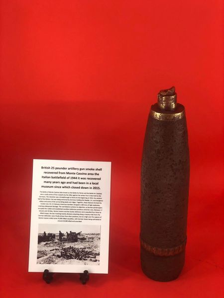 British 25 pounder smoke shell nice condition relic fired shell with brass colour and original green paintwork recovered from Monte Cassino the Italian battlefield of 1944 from a local museum which closed down in 2015