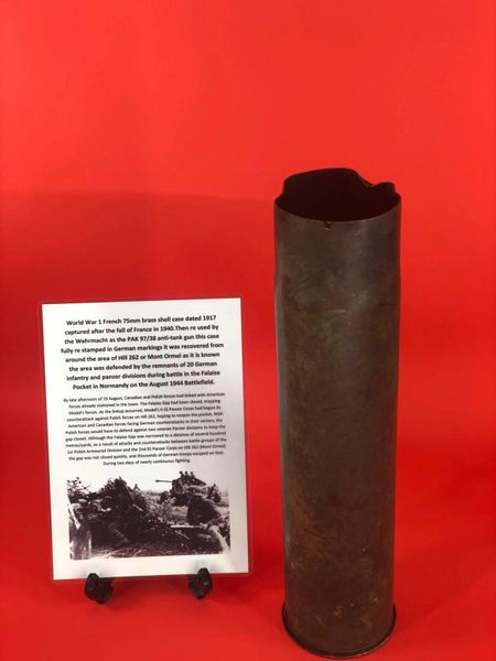 French 75mm brass shell case dated 1917,primer dated 1940 re used as the PAK 97/38 anti-tank gun used by the German Army gun which is re stamped on the bottom in German markings it was recovered in area of Hill 262 or Mont Ormel in Normandy 1944