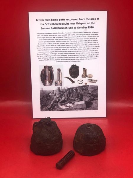 British mills bomb hand grenade which is a top section and a bottom section with No23 base plate in place with detonator, nice solid relics very well cleaned recovered in Schwaben Redoubt near Thiepval on the Somme battlefield of July 1916