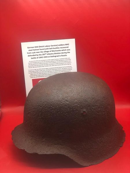 German RAD [Reich Labour Service] soldiers M42 helmet complete- green paintwork remains found with RAD buckles recovered in the area of the village of Marinovka which was defended by the 297th Infantry Division during the battle of 1942-1943 at Stalingrad