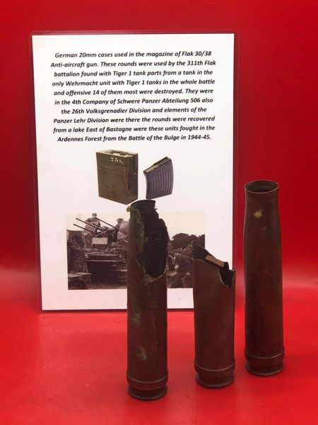 German 20mm brass cases dated 1938-1939 fired by Flak 30/38 Anti-Aircraft gun belonging to Luftwaffe 311th Flak battalion recovered from a Lake East of Bastogne from battle of the Bulge 1944-1945