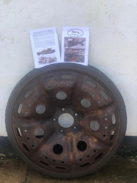 Half a large track wheel, nice relic condition relic with original sand colour paintwork with some tyre remains used by German sdkfz 7 half track of the 116th Panzer Division recovered from near Houffalize in the Ardennes forest 1944-1945