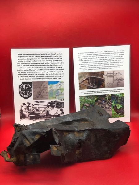 German battle damaged 20mm flak 30/38 anti-aircraft gun twin magazine box lid with blue paintwork recovered from German ammunition storage bunker used by SS Nordland Division-the 1944 Narva Battle in Estonia, untouched until recovered in 2022+dig pictures