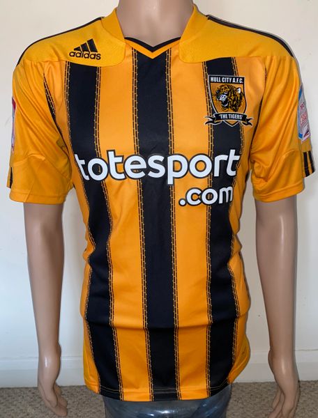 2010/11 MATCH WORN AND SIGNED HULL CITY HOME SHIRT (McSHANE #6)