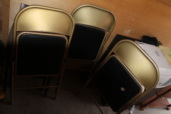 3 Gold Metal Folding Chairs With Black Pads
