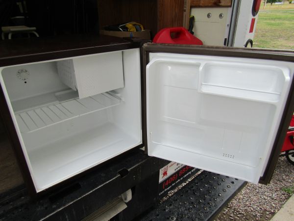 Brown GE Counter Top Microwave Refrigerator/Freezer