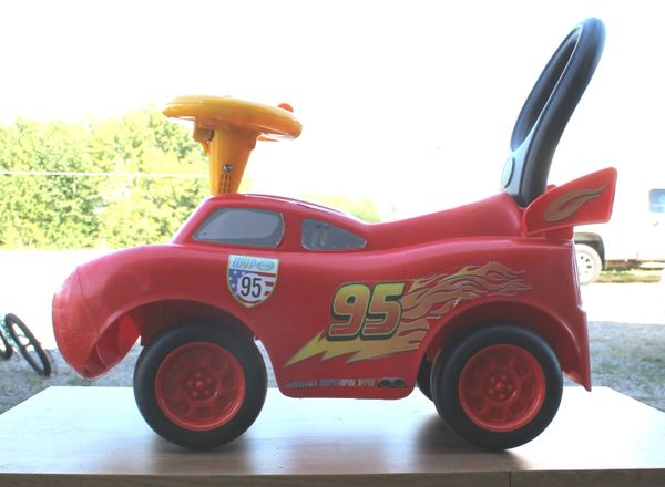 Disney Pixar CARS Toddler Ride and Push Toy with LIGHTS AND SOUNDS