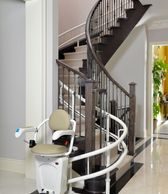 Curved stairway lift, custom stairlift, savaria, bruno, acorn
