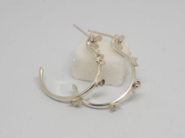 Delicate silver flower earrings