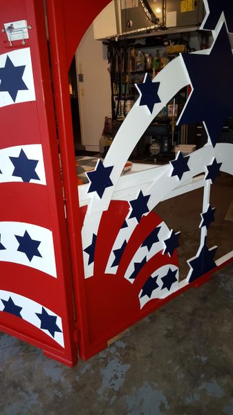 dog kissing booth the american flag