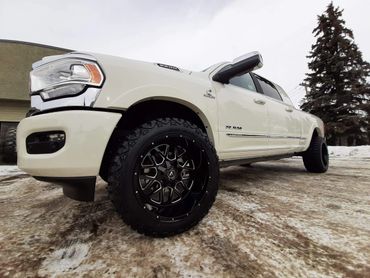 20x12
armed combat
offroad
wheels
xd grenade
black milled
milling
lifted ram
white dodge
rims
stance