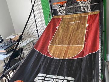 Get that arcade game experience with this new indoor/outdoor basketball system. Comes with built in 