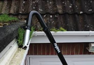 Gutter cleaning using the SkyVac system.