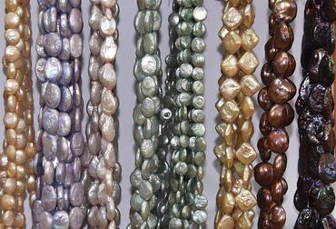 Colored pearls. Lavender, Green, Yellow Oval, Coin and Baroque strands of Pearls 