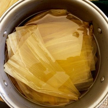 Corn husks in water bath