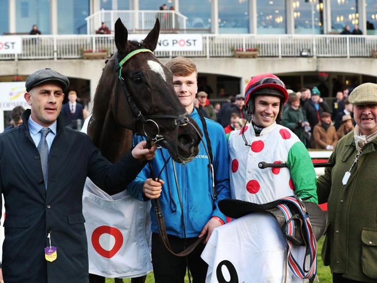 Adrian Keatley is photographed with a winning racehorse