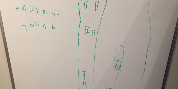 Child's drawing of tall buildings labeled 'Anderson House'.