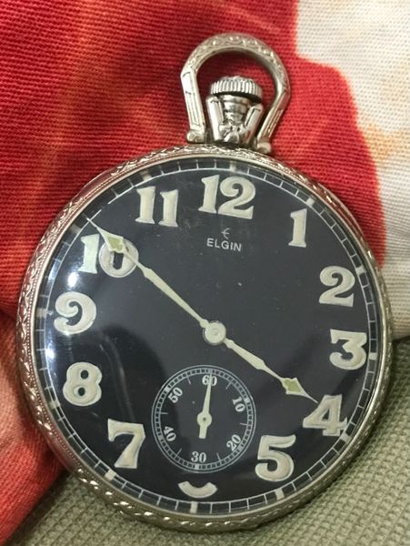 Vintage Elgin Clock Watches