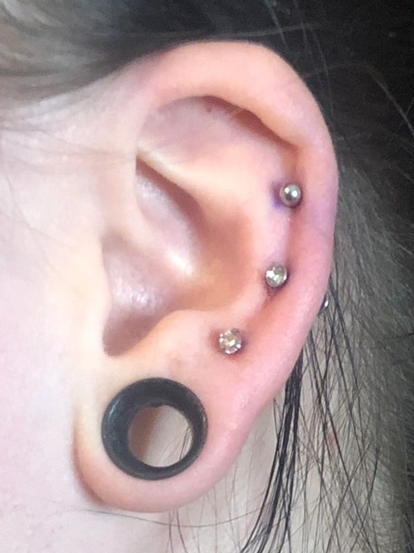 Triple Cartilage, Gauge ear piercing top of the ear piercing three piercings with gauge