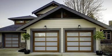 Residential full view glass overhead garage door, glass garage door, smoke glass overhead door. 