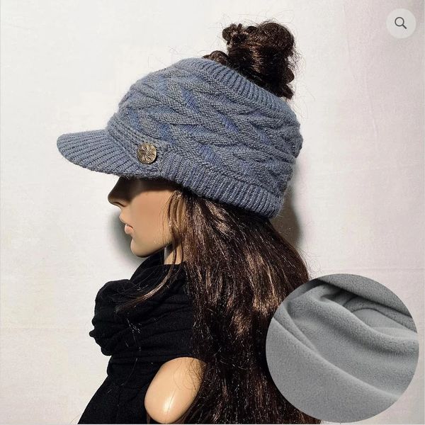 Fleece hat with store ponytail hole