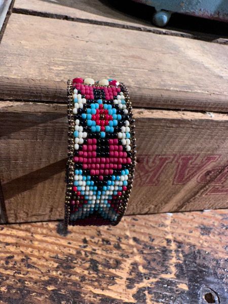 Red Fly Cross Chili Rose Cuff
