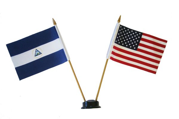 NICARAGUA & USA SMALL 4" X 6" INCHES MINI DOUBLE COUNTRY STICK FLAG BANNER ON A 10 INCHES PLASTIC POLE .. NEW AND IN A PACKAGE