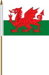 WALES 4" X 6" INCHES MINI COUNTRY STICK FLAG BANNER ON A 10 INCHES PLASTIC POLE .. NEW AND IN A PACKAGE.