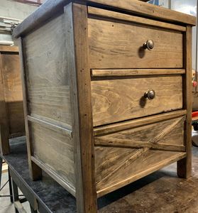 Farmhouse Timber Bedside table includes two standard drawers and one hidden additional drawer.
