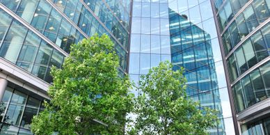 large office building with glass windows showcasing janitorial services
