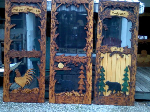 custom carved screen door  Otter Lake Rustics Adirondack furnishings decor  and souvenirs