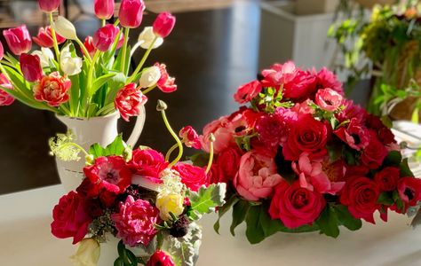 Wedding Flowers in a tall vase, bridal bouquet wedding flowers on the table.