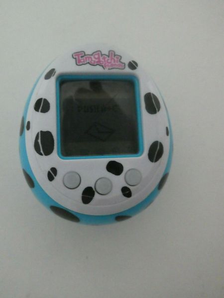 TAMAGOCHI with spotted case - BANDAI