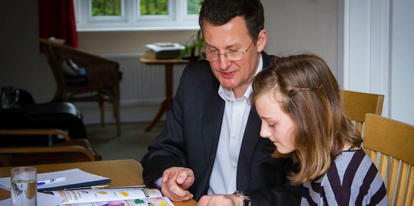 Steve tutoring a pupil
